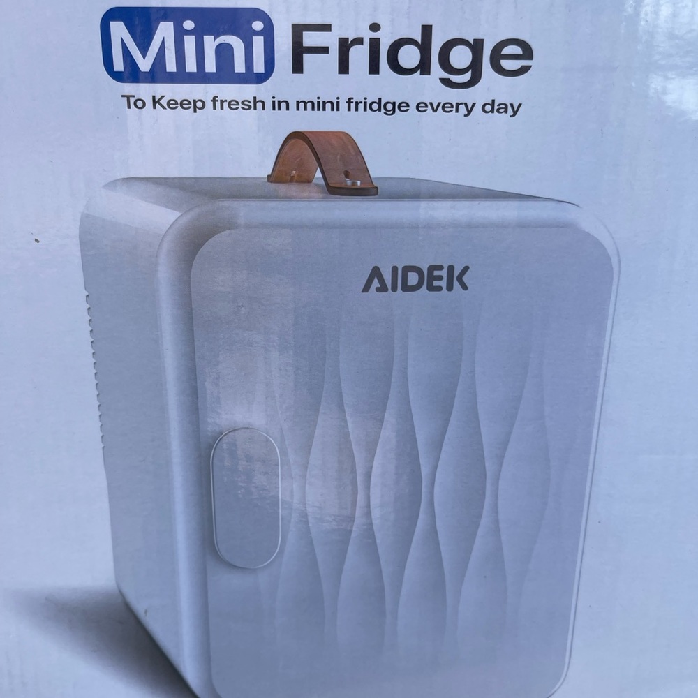 Mini white Aidek fridge .